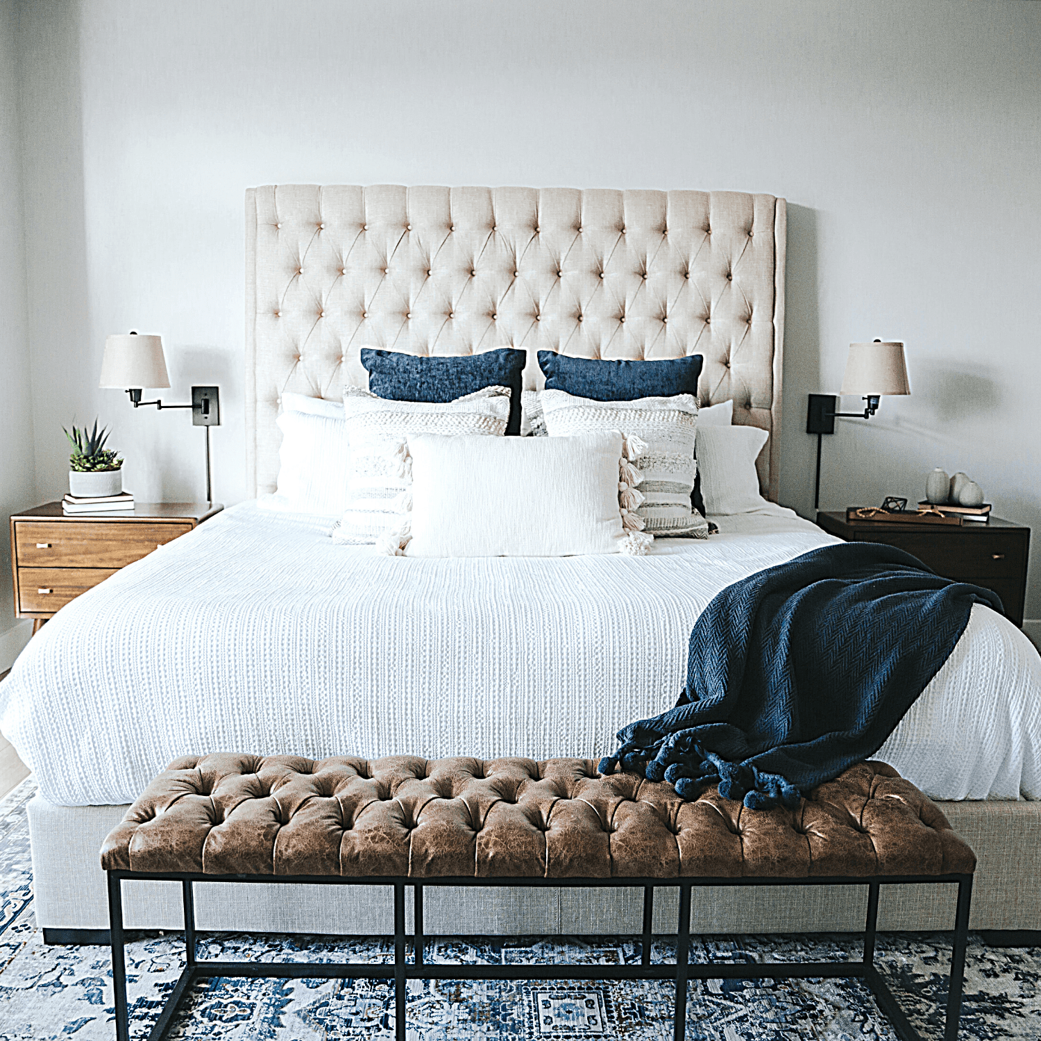 White bed with navy blue accents